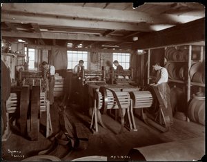 Interior view of men working with leather at the New York Leather Belting Co., New York, 1905